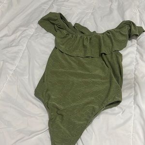 it is a green top and its from eye candy and the size is a large